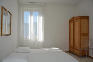 Postel nebo postele na pokoji v ubytování Hotel Villa Selva + 37 fotografií