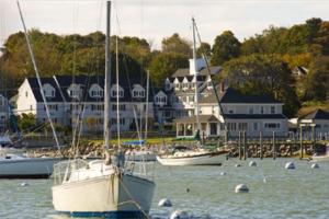 boats are docked in the water at The Inn at Scituate Harbor in Scituate