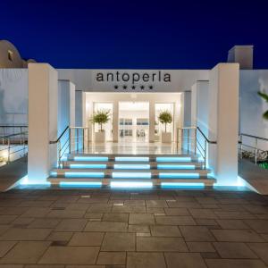 a building with blue lights on the stairs at Antoperla Luxury Hotel & Spa in Perissa