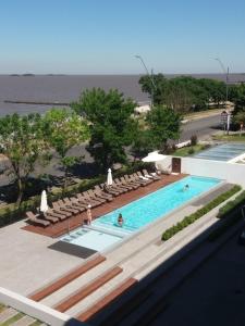 Πισίνα στο ή κοντά στο Mono Balcón Vista al Río Nª 509, Colonia del Sacramento