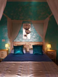 a bedroom with a bed with a canopy at Donkey on the Beach in Cobbs Cross
