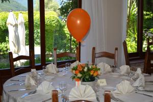 a table with an orange balloon on top of it at Hotel Danila in Portoferraio