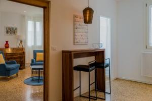 Posedenie v ubytovaní Ca' Dandolo, affaccio sul canale