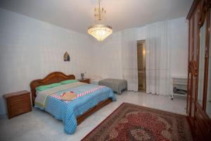 Postel nebo postele na pokoji v ubytování Rosa di Calabria