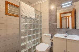 Koupelna v ubytování Apartamentos Obelisc