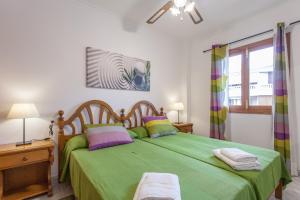 Postel nebo postele na pokoji v ubytování Apartamentos Obelisc + 37 fotografií