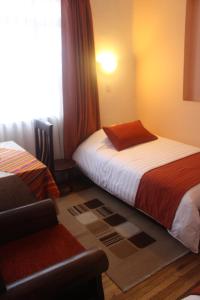 Letto o letti in una camera di Hotel Andino