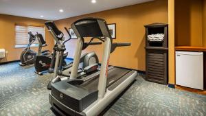a gym with two exercise bikes in a room at Best Western Plus Country Meadows Inn in Aldergrove