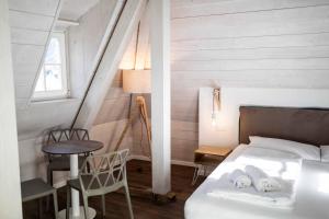 Postel nebo postele na pokoji v ubytování Stay COOPER l Guesthouse zum Löwen