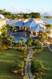 an aerial view of a resort with a swimming pool at Pearle Beach Resort & Spa in Flic-en-Flac