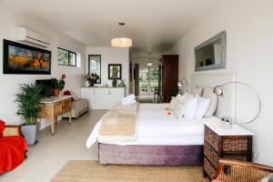 Ein Bett oder Betten in einem Zimmer der Unterkunft Radium Hall Guest House