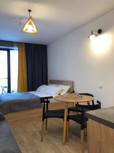 Ένα ή περισσότερα κρεβάτια σε δωμάτιο στο New Gudauri Room 526