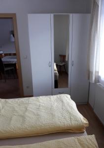 A bed or beds in a room at Temblhof