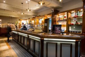 a large bar with a large counter top at Toby Carvery Birmingham West by Innkeeper's Lodge in Birmingham