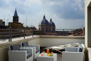 Uma varanda ou terraço em UNA HOTELS Decò Roma