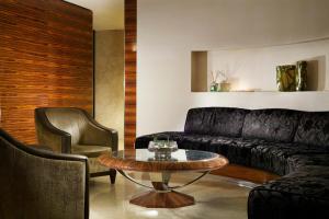 Uma área de estar em UNA HOTELS Decò Roma