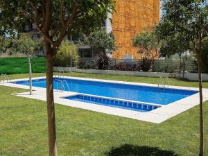 Bazén v ubytovaní For a Stay Las Dunas alebo v jeho blízkosti