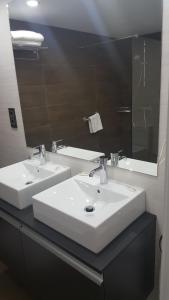 Phòng tắm tại Apartamentos Centro Colón