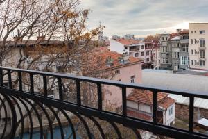 a view of a city from a balcony at Beautiful best location apartment "Blue Mouse" in Plovdiv