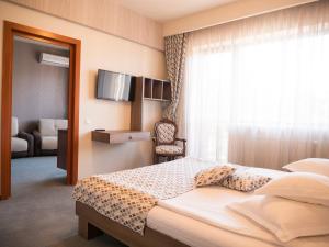 Кровать или кровати в номере Best Western Silva Hotel