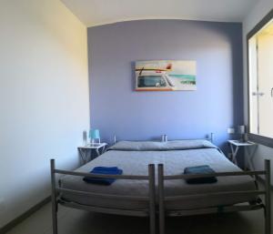 Posteľ alebo postele v izbe v ubytovaní Villa Carrubbedda
