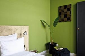 Un pat sau paturi într-o cameră la Numa Marrakech