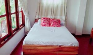 Uma cama ou camas num quarto em Broad view