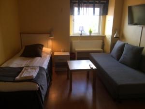 Voodi või voodid majutusasutuse Hotell Paradis toas