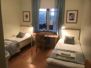 Voodi või voodid majutusasutuse Hotell Paradis toas