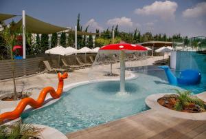 a swimming pool with at Asterias Beach Hotel in Ayia Napa