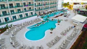 an overhead view of a swimming pool at a hotel at Asterias Beach Hotel in Ayia Napa