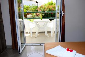A balcony or terrace at Cavos Beach House