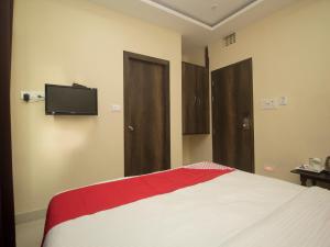 Ένα ή περισσότερα κρεβάτια σε δωμάτιο στο Hotel Mount View, Siliguri