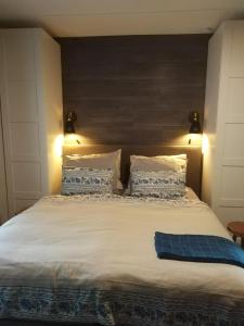 En eller flere senge i et værelse på B&B Hoofddorp