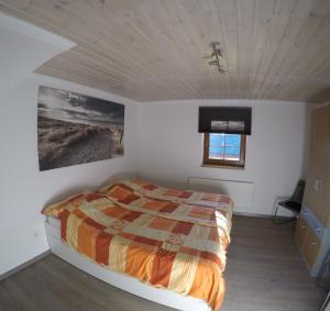Postel nebo postele na pokoji v ubytování Haus Pistenblick