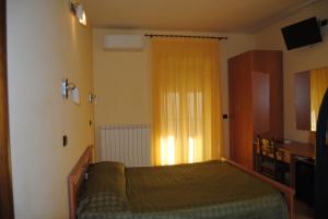 Postel nebo postele na pokoji v ubytování B&B Atlantide