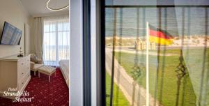 TV a/nebo společenská místnost v ubytování Strandvilla Seelust + 37 fotografií