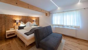 A bed or beds in a room at Haus Horngacher