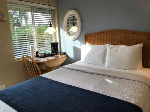 Postel nebo postele na pokoji v ubytování Casitas Coral Ridge