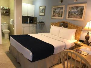 Postel nebo postele na pokoji v ubytování Casitas Coral Ridge