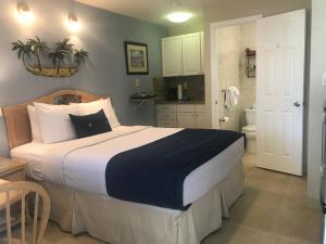 Postel nebo postele na pokoji v ubytování Casitas Coral Ridge