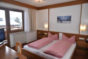 Katil atau katil-katil dalam bilik di Alphotel Mittersill # inklusive Sommercard #