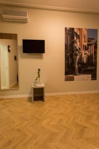 TV a/nebo společenská místnost v ubytování Le Affacciate Bruzie Home Guest House
