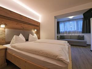 Postel nebo postele na pokoji v ubytování Residence Rautal B&B ***S