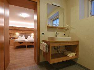 Postel nebo postele na pokoji v ubytování Residence Rautal B&B ***S