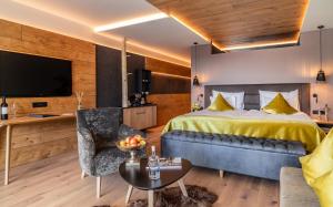 Postel nebo postele na pokoji v ubytování Boutique Hotel Kircher