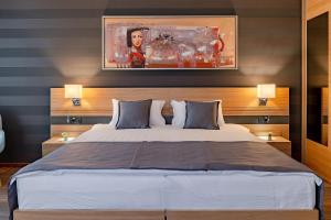 Rubicon Garni Hotel客房内的一张或多张床位