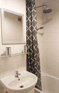 Kúpeľňa v ubytovaní Apartament Pańska