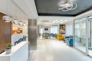 Rubicon Garni Hotel的休息区