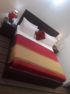 Posteľ alebo postele v izbe v ubytovaní BnB Hotel